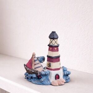 Vintage Lighthouse Figurine with Sailboat Nautical Coastal Shelf Decor